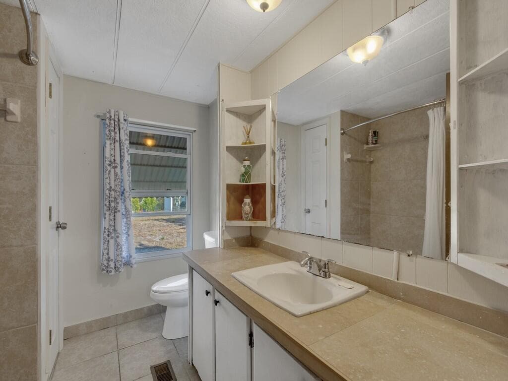 335 NE Tropicalia Lane, Jensen Beach, FL 34957 25
