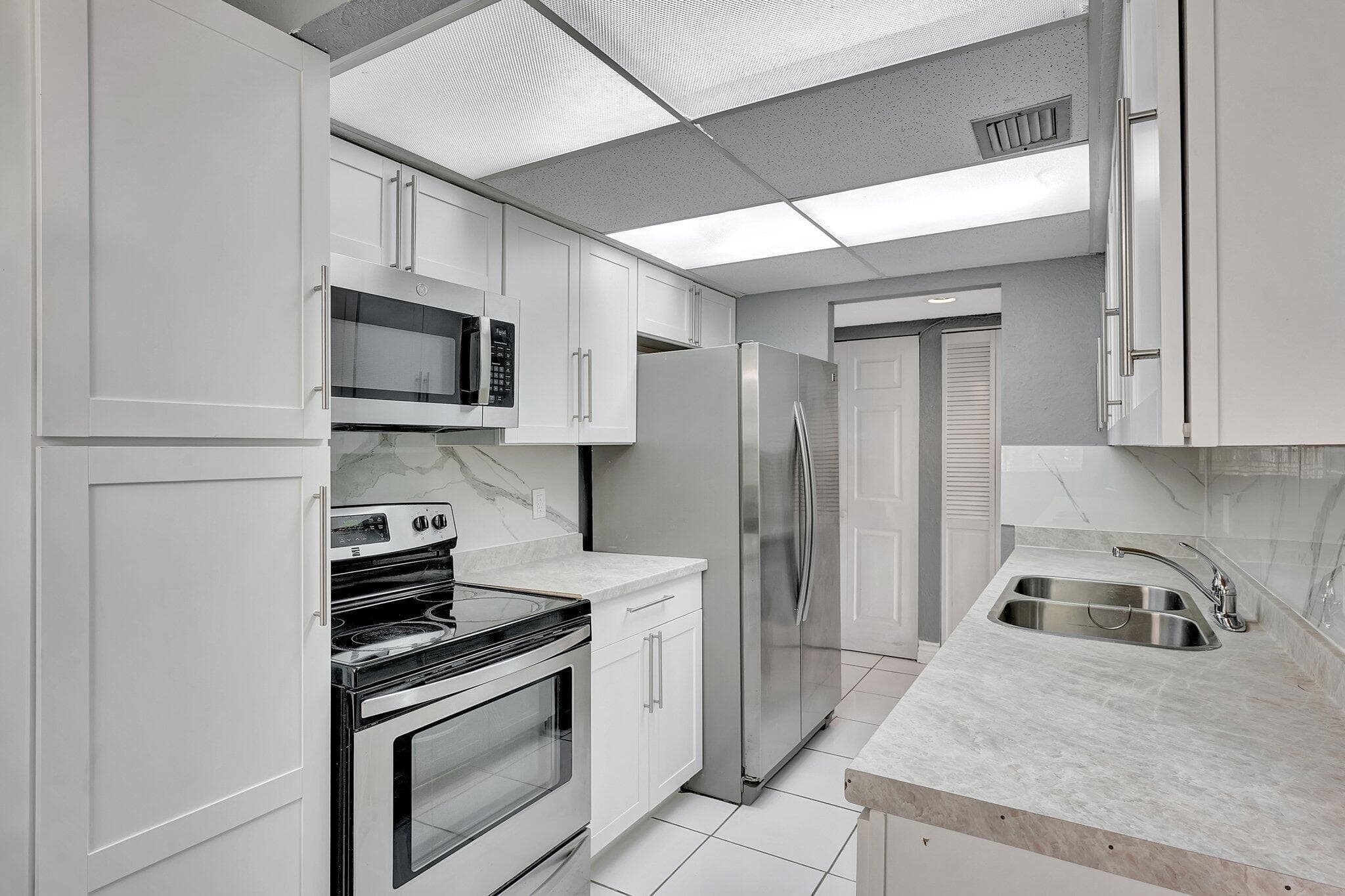 6190 Woodlands Boulevard 311, Tamarac, FL 33319 14