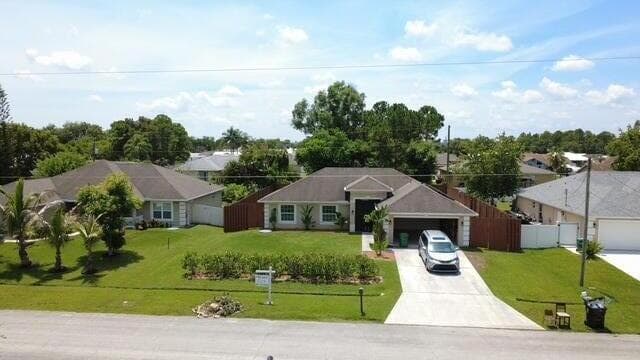 150 SW De Gouvea Terrace, FL 34984 3